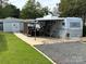 Spacious RV site with covered parking and golf cart at 134 Dove Ln, New London, NC 28127