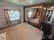 Main bedroom with a double bed and mirrored closet doors at 134 Dove Ln, New London, NC 28127