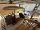 Covered patio with golf cart and outdoor seating at 134 Dove Ln, New London, NC 28127