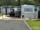 Spacious RV site with covered parking and golf cart at 134 Dove Ln, New London, NC 28127