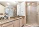 Modern bathroom with granite countertop and glass shower at 1100 Metropolitan Ave # 305, Charlotte, NC 28204