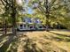 Charming two-story house with a metal roof and a spacious porch at 3018 Castlebrook Dr, Monroe, NC 28112