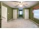 Bright bedroom with two closets and a ceiling fan at 3018 Castlebrook Dr, Monroe, NC 28112