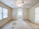 Spacious bedroom with ceiling fan and two closets at 3018 Castlebrook Dr, Monroe, NC 28112
