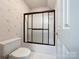 Clean bathroom with tub and shower at 3018 Castlebrook Dr, Monroe, NC 28112