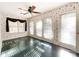 Sunroom with multiple windows and patterned wallpaper at 3018 Castlebrook Dr, Monroe, NC 28112