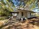 House with deck and pergola in wooded setting at 3018 Castlebrook Dr, Monroe, NC 28112