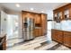 Spacious kitchen with wood cabinets, stainless steel appliances and vinyl flooring at 3018 Castlebrook Dr, Monroe, NC 28112