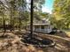 Two story house with wrap around porch and large lot at 3018 Castlebrook Dr, Monroe, NC 28112