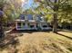 Charming house with a metal roof and a spacious front porch at 3018 Castlebrook Dr, Monroe, NC 28112