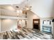 Spacious great room with vaulted ceiling, fireplace, and hardwood floors at 3018 Castlebrook Dr, Monroe, NC 28112