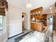 Bright dining area with wood flooring and kitchen views at 3018 Castlebrook Dr, Monroe, NC 28112