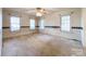 Spacious bedroom with carpeting and two windows at 3018 Castlebrook Dr, Monroe, NC 28112