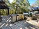 Outdoor kitchen with grill and mini-fridge at 3018 Castlebrook Dr, Monroe, NC 28112
