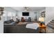 Open living room with sectional sofa and hardwood floors at 2680 Andes Dr, Statesville, NC 28625