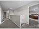 Upstairs hallway with access to bedrooms at 2680 Andes Dr, Statesville, NC 28625