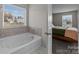 Relaxing bathroom with garden tub and bedroom view at 2680 Andes Dr, Statesville, NC 28625