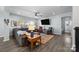 Relaxing living room with sectional sofa and hardwood floors at 2680 Andes Dr, Statesville, NC 28625