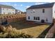 Large backyard with a patio and wooden fence at 2680 Andes Dr, Statesville, NC 28625