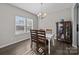 Dining room with hardwood floors and decorative hutch at 2680 Andes Dr, Statesville, NC 28625