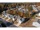 Aerial view of a neighborhood with houses in autumn colors at 2680 Andes Dr, Statesville, NC 28625
