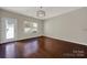Bright dining room with hardwood floors and access to the backyard at 2013 Firefly Ln, Fort Mill, SC 29715