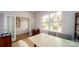 Home office with built-in shelving and large window overlooking the community at 3668 Charles Nw St, Conover, NC 28613