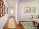 Bright and airy entryway with wood-look floors and stylish wall decor at 3668 Charles Nw St, Conover, NC 28613