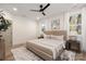 Spacious bedroom featuring a comfortable bed and large windows at 1401 Meadow Ln, Charlotte, NC 28205