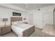 Bedroom with a queen-size bed and two nightstands at 1315 East Blvd # 408, Charlotte, NC 28203