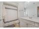 Clean bathroom with a shower/tub combo and white vanity at 1315 East Blvd # 408, Charlotte, NC 28203