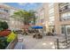 Community courtyard with benches and colorful umbrellas at 1315 East Blvd # 408, Charlotte, NC 28203