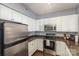 Modern kitchen featuring stainless steel appliances and granite countertops at 1315 East Blvd # 408, Charlotte, NC 28203