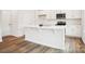 Kitchen island with white cabinets and quartz countertops at 8059 Plymouth Dr, Sherrills Ford, NC 28673