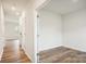 Bright hallway with light walls and wood-look flooring at 8059 Plymouth Dr, Sherrills Ford, NC 28673