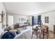 Dining area with wooden table and chairs, adjacent to living room at 229 Sailwinds Rd, Mooresville, NC 28115