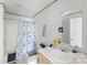 Bathroom with shower/tub combo and floral shower curtain at 229 Sailwinds Rd, Mooresville, NC 28115