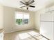 Bright eat-in kitchen features a refrigerator and tile floor at 1623 Forest Stream Ct, Charlotte, NC 28213