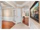Open hallway with view of home office and living area at 45014 Wigeon Ln # 100, Indian Land, SC 29707