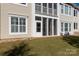 Exterior view showing screened porch and yard at 45014 Wigeon Ln # 100, Indian Land, SC 29707
