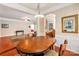 Bright dining area with hardwood floors and decorative wall art at 45014 Wigeon Ln # 100, Indian Land, SC 29707