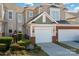 Townhouse exterior with brick and siding, two-car garage at 45014 Wigeon Ln # 100, Indian Land, SC 29707