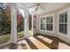 Screened porch with view of backyard and trees at 45014 Wigeon Ln # 100, Indian Land, SC 29707
