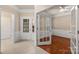 Bright and spacious entryway with hardwood floors and access to multiple rooms at 45014 Wigeon Ln # 100, Indian Land, SC 29707