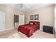Comfortable bedroom with en-suite bathroom access and neutral walls at 45014 Wigeon Ln # 100, Indian Land, SC 29707