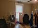 Bright bedroom with window, wood floors, and various items at 425 Maupin Ave, Salisbury, NC 28144