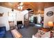 Cozy living room with spiral staircase and wood accents at 1111 & 1075 Turkey Creek Ridge Rd, York, SC 29745
