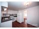 Small kitchen with white cabinets and dark countertops at 1111 & 1075 Turkey Creek Ridge Rd, York, SC 29745