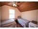 Bedroom with two twin beds and wood ceiling at 1111 & 1075 Turkey Creek Ridge Rd, York, SC 29745