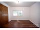 Simple bedroom with double doors and two windows at 1111 & 1075 Turkey Creek Ridge Rd, York, SC 29745